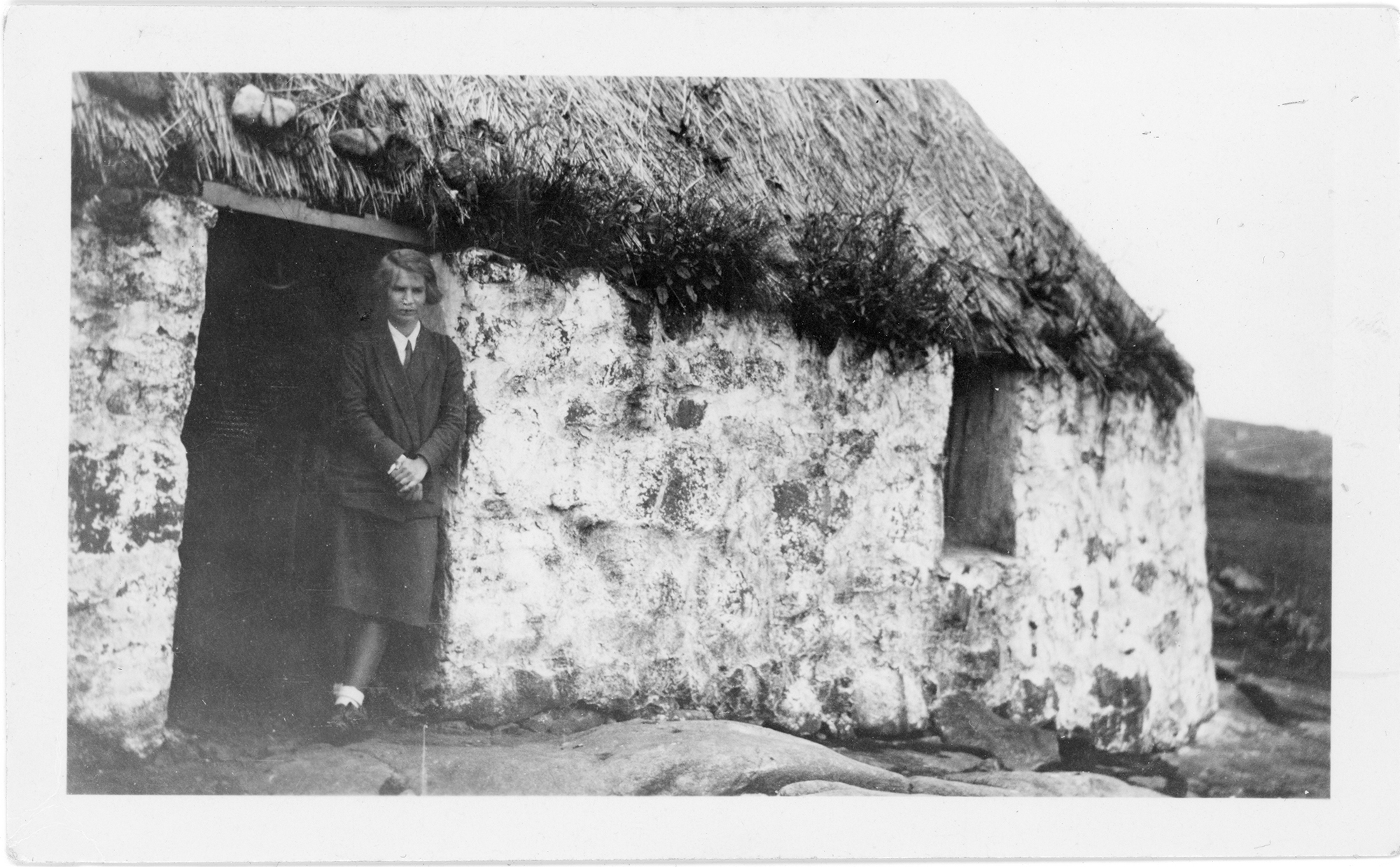 Margaret in the doorway of the MacRaes’ house.