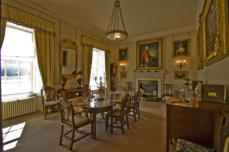 Paintings hang on the wall in the Dining Room of Leith Hall.