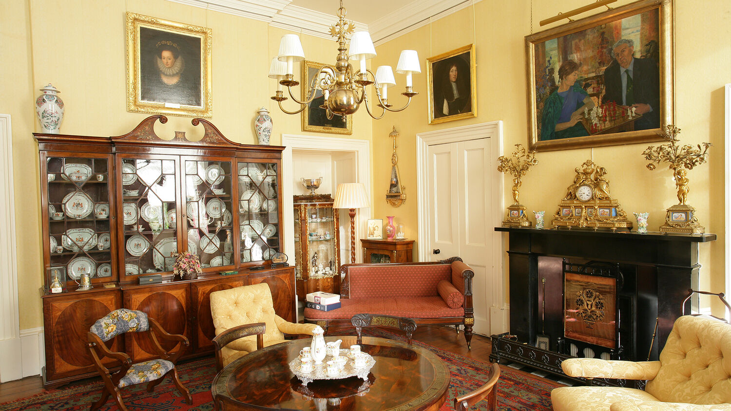 Beautiful furniture, paintings and artefacts adorn the morning room in the House of the Binns