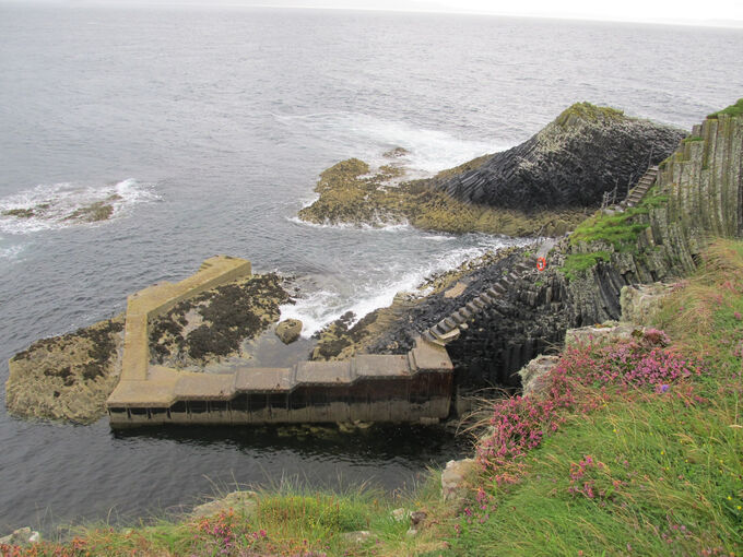 The landing jetty at Staffa, where a narrow set of steps lead up the side of the cliff.