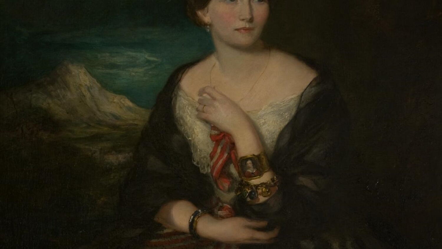 A portrait of a young Georgian woman, seated beneath a tree with a tall mountain on the backdrop. She wears a long white dress with a blue shawl, and holds a red ribbon in her hands. She is wearing several bracelets, one of which has a small portrait framed on it. She is looking to the side, with a slightly wistful expression on her face.