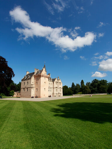 Brodie Castle in the distance on a sunny day