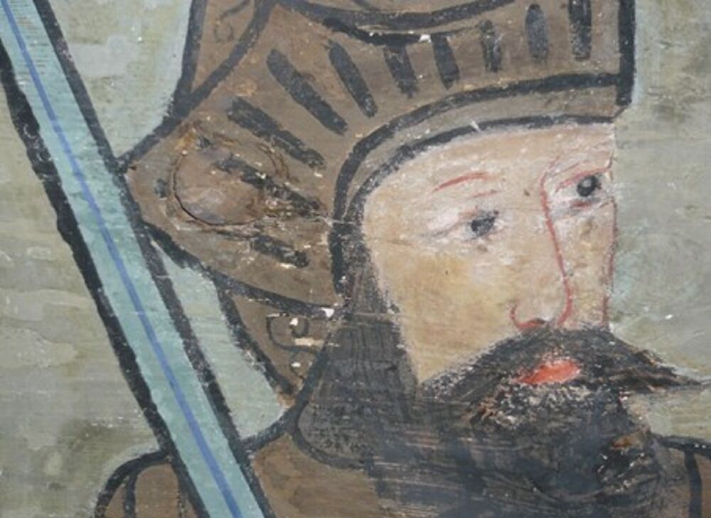A detail of a 17th-century painted illustration of a knight-like figure. The close-up shows his face and helmet, as well as the long blade of a sword resting on his shoulder.