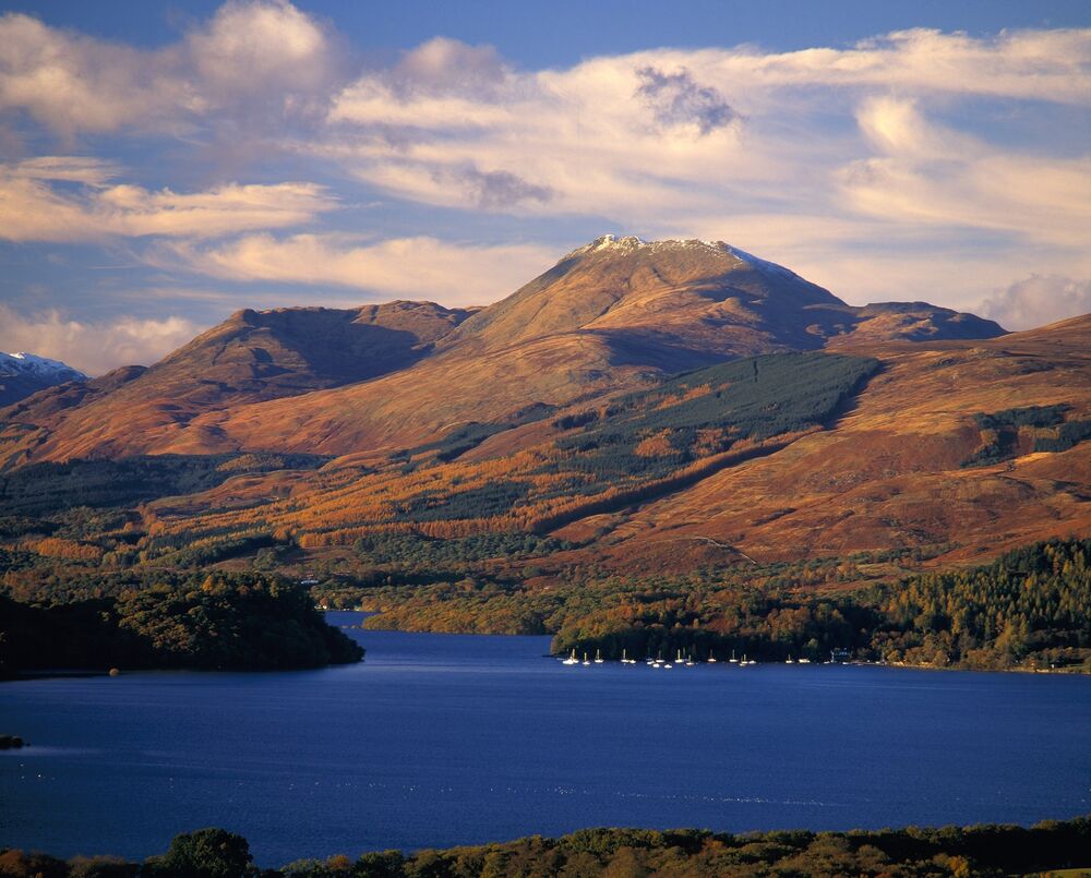 Looking across a very blue Loch Lomond to the peak of Ben Lomond.
